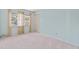 This is a spacious bedroom with carpet and a double door closet at 6100 Alligator Lake W Shr, St Cloud, FL 34771