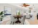 Cozy breakfast nook with a round table and natural lighting at 6100 Alligator Lake W Shr, St Cloud, FL 34771
