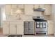Well-maintained kitchen with white cabinets and stainless steel appliances at 6100 Alligator Lake W Shr, St Cloud, FL 34771