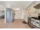 Open concept kitchen with stainless steel appliances and ample cabinet space at 6100 Alligator Lake W Shr, St Cloud, FL 34771