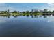 Scenic lake view featuring calm waters and waterfront homes, highlighting a tranquil residential setting at 6100 Alligator Lake W Shr, St Cloud, FL 34771