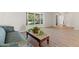 Bright living room featuring new floors and a bay window at 6100 Alligator Lake W Shr, St Cloud, FL 34771