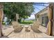 Charming patio featuring comfortable seating, pergola, and serene views of the water at 6100 Alligator Lake W Shr, St Cloud, FL 34771