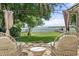Inviting patio area with waterfront views, perfect for relaxing and enjoying the outdoors at 6100 Alligator Lake W Shr, St Cloud, FL 34771