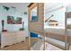 bedroom featuring custom bunk beds with TV and beach themed decor at 8401 Secret Key Cv, Kissimmee, FL 34747