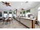 Charming cafe with ample seating, wood accents, and tropical-themed decor at 8401 Secret Key Cv, Kissimmee, FL 34747