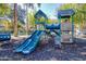 Fun playground with slides, climbing structures, and soft ground covering at 8401 Secret Key Cv, Kissimmee, FL 34747
