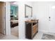 View to bedroom with stylish decor with comfortable bed from entryway at 8936 Sydney Ave, Kissimmee, FL 34747