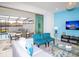 Comfortable living room offering stylish furniture and sliding doors to a private pool and patio at 8936 Sydney Ave, Kissimmee, FL 34747