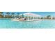 Community resort pool with lounge chairs and shade structures at 8936 Sydney Ave, Kissimmee, FL 34747