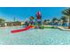 Community water park with slides and splash pad at 8936 Sydney Ave, Kissimmee, FL 34747