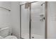 Clean and modern bathroom featuring a glass-enclosed shower, providing a refreshing and sleek design at 978 Splash Shot Pl, Davenport, FL 33896