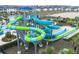 Community water park featuring tall, winding water slides for thrilling summer fun at 978 Splash Shot Pl, Davenport, FL 33896