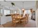Inviting dining room area filled with natural light, offering a comfortable space for meals and gatherings at 1010 Prey Ct, Kissimmee, FL 34746