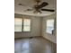 Bedroom featuring neutral-colored walls and window blinds, creating a cozy ambiance at 1011 26Th Street, Orlando, FL 32805