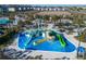 The community includes a fun splash pad with colorful slides and water features for Gathering fun and enjoyment at 1034 Splash Shot Pl, Davenport, FL 33896