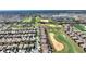 An aerial view of the home next to a golf course at 1335 Palmetto Dunes St, Davenport, FL 33836