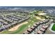 Aerial view of home next to a golf course at 1335 Palmetto Dunes St, Davenport, FL 33836