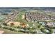 Scenic aerial view of property and golf course at 1335 Palmetto Dunes St, Davenport, FL 33836