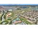 High-angle aerial view showcasing community amenities and proximity to major attractions at 1335 Palmetto Dunes St, Davenport, FL 33836