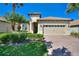 Beautiful home with well-maintained landscaping and a spacious two-car garage at 1335 Palmetto Dunes St, Davenport, FL 33836