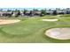 Scenic golf course view featuring lush green grass, sand traps, and manicured landscaping at 1335 Palmetto Dunes St, Davenport, FL 33836