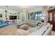 Comfortable living room with large windows and plenty of natural light at 1335 Palmetto Dunes St, Davenport, FL 33836