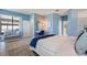 Main bedroom with a private balcony and ensuite bathroom at 1335 Palmetto Dunes St, Davenport, FL 33836