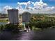 Aerial view showcasing the beautiful buildings, grounds, and waterfront at 13427 Blue Heron Beach Dr # 1607, Orlando, FL 32821