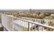 Aerial view from a balcony with a view of a parking lot, highway, and building at 13427 Blue Heron Beach Dr # 1607, Orlando, FL 32821