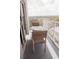 Balcony featuring a white metal railing and outdoor seating, offering expansive city views at 13427 Blue Heron Beach Dr # 1607, Orlando, FL 32821
