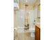 Well-maintained bathroom featuring a shower-tub combination and granite vanity with vanity lighting at 13427 Blue Heron Beach Dr # 1607, Orlando, FL 32821