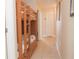 Cozy bedroom featuring bunk beds and tiled flooring that leads to a hallway and interior doors at 13427 Blue Heron Beach Dr # 1607, Orlando, FL 32821