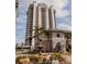 Elegant condominium building with lush landscaping, offering luxurious residences and stunning architecture at 13427 Blue Heron Beach Dr # 1607, Orlando, FL 32821