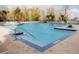 Enjoy the large community pool with lounge seating and palms in this beautiful area at 13427 Blue Heron Beach Dr # 1607, Orlando, FL 32821