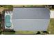 Aerial view of a gray shingled roof and screened-in pool at 1361 Rebecca Dr, Haines City, FL 33844