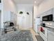 Modern kitchen with light gray cabinets, granite countertops, and stainless steel appliances at 1361 Rebecca Dr, Haines City, FL 33844
