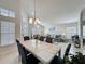 Bright and airy living space combining dining and living areas for seamless flow at 1361 Rebecca Dr, Haines City, FL 33844