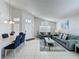 Open-concept living and dining area with neutral tones and plenty of natural light at 1361 Rebecca Dr, Haines City, FL 33844