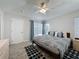 Bedroom featuring natural light, light walls, ceiling fan, and slider to outdoor patio at 1361 Rebecca Dr, Haines City, FL 33844
