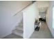 Bright foyer and staircase with a modern decor at 1371 Red Blossom Ln, Kissimmee, FL 34746