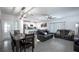 Inviting living room and dining room combination featuring modern furnishings at 1371 Red Blossom Ln, Kissimmee, FL 34746