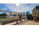 Picturesque courtyard featuring a pergola, potted plants, and scenic views of a lake and the city skyline at 151 E Washington St # 327, Orlando, FL 32801