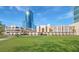 Low-rise, upscale condo building with large manicured lawn, ideal for relaxation and recreation at 151 E Washington St # 327, Orlando, FL 32801