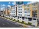 Apartment building exterior featuring multiple stories, balconies, and well-maintained landscaping at 151 E Washington St # 327, Orlando, FL 32801