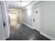 Clean hallway with neutral colors, multiple doors, and well-maintained flooring at 151 E Washington St # 327, Orlando, FL 32801