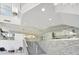 Modern lobby with stylish staircase, glass walls, and contemporary design elements at 151 E Washington St # 327, Orlando, FL 32801