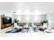 Inviting lounge area with stylish seating, contemporary decor, and a large-screen television at 151 E Washington St # 327, Orlando, FL 32801