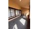 Covered porch with seating area and neutral walls at 20 S Flag Ct, Kissimmee, FL 34759