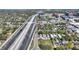Overhead view of a residential area with a house near a highway at 204 E Harvard St, Orlando, FL 32804